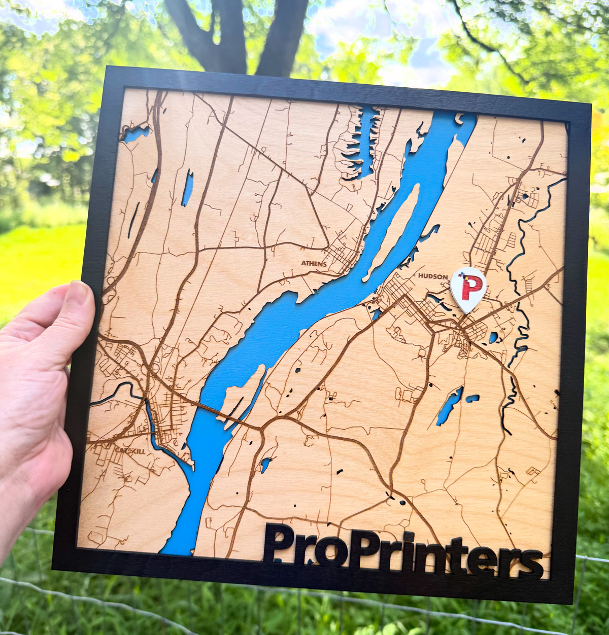 relief map of hudson river with business location marked as icon and on frame.